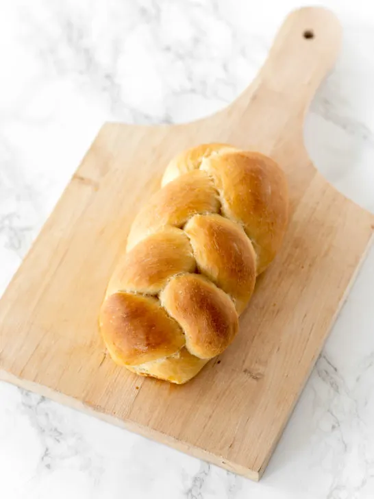 vegan challah bread on a cutting board